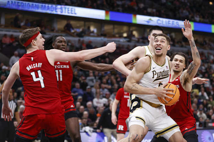 Mason Gillis (0) goes to the basket against the Rutgers Scarlet Knights.